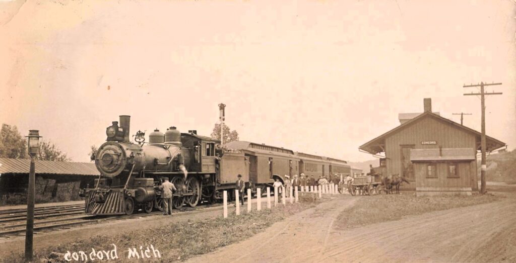 Old train station with steam locomotive