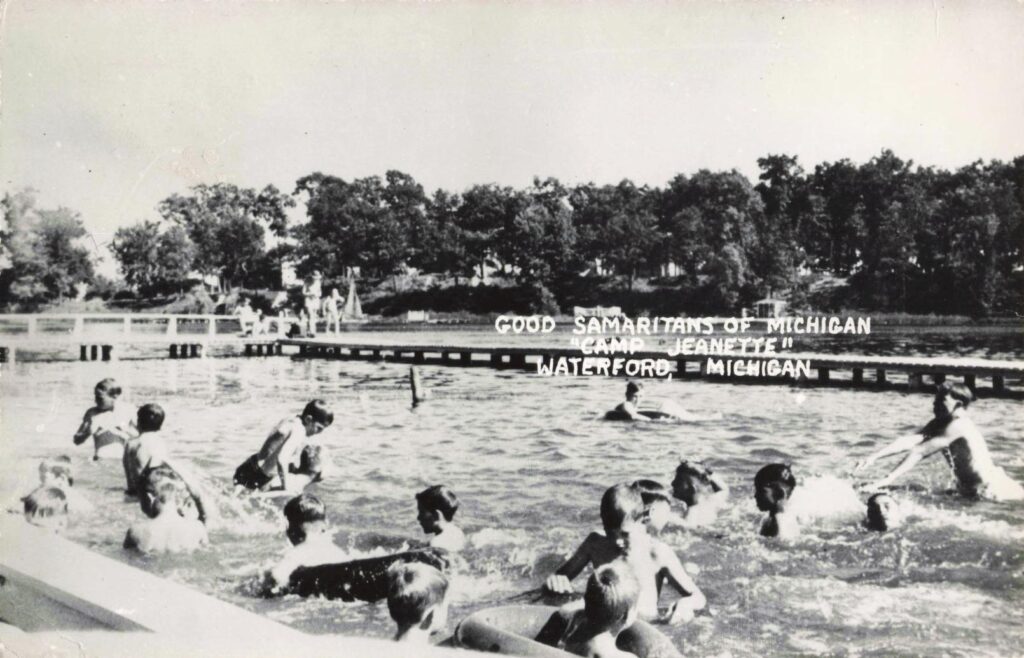 Boys swim at Camp Jeanette, showing why Waterford’s lakes made the site valuable for a summer charity camp.