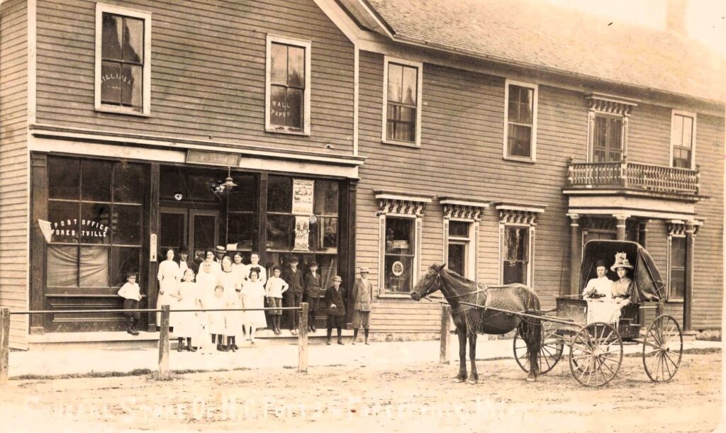 Historic scene with horse-drawn carriage.