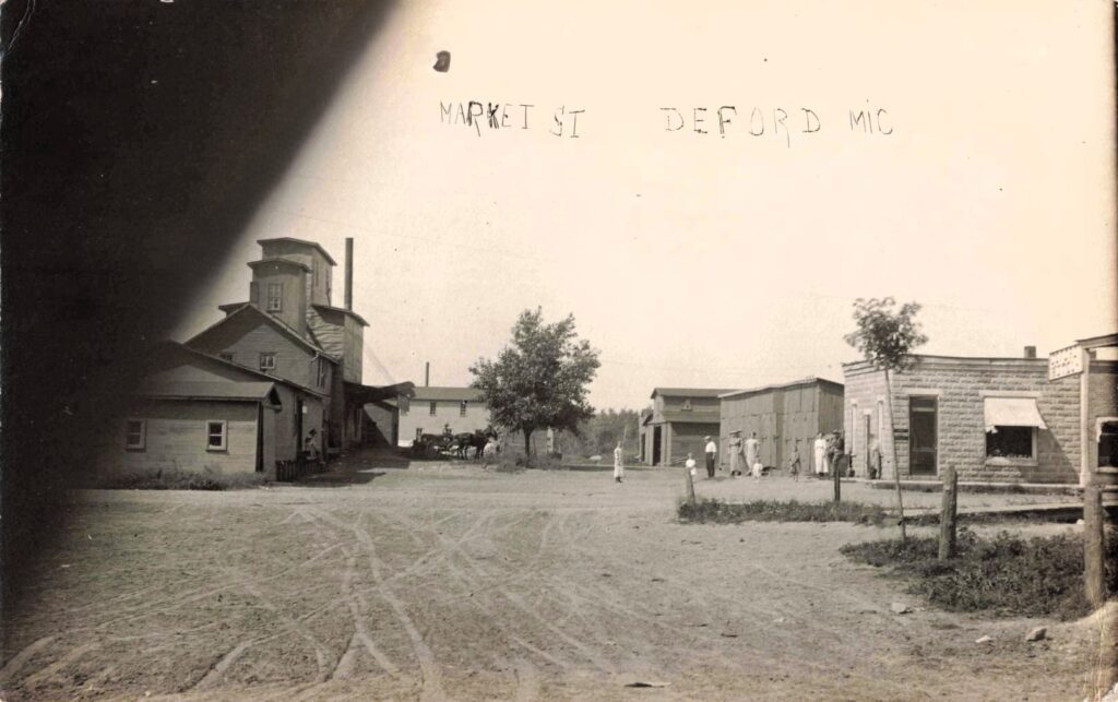Market Street connected local businesses with the grain elevator and railroad. The elevator dominated Deford's skyline for many years.