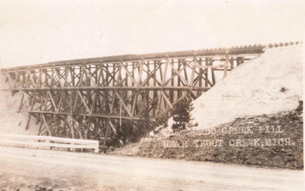 Timber railroad fill under construction near Trout Creek Michigan in 1926.