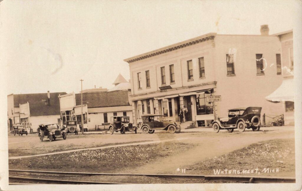Lunchroom and street in Watersmeet, Michigan, in 1927.