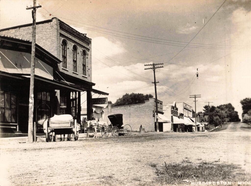 Street scene in Hubbardston Mich in the early 1900s