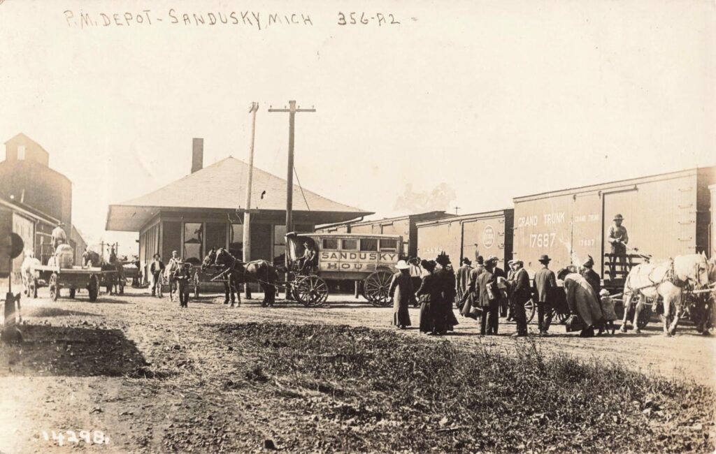 Pere Marquette Depot with Sandusky House Wagon waiting for passengers