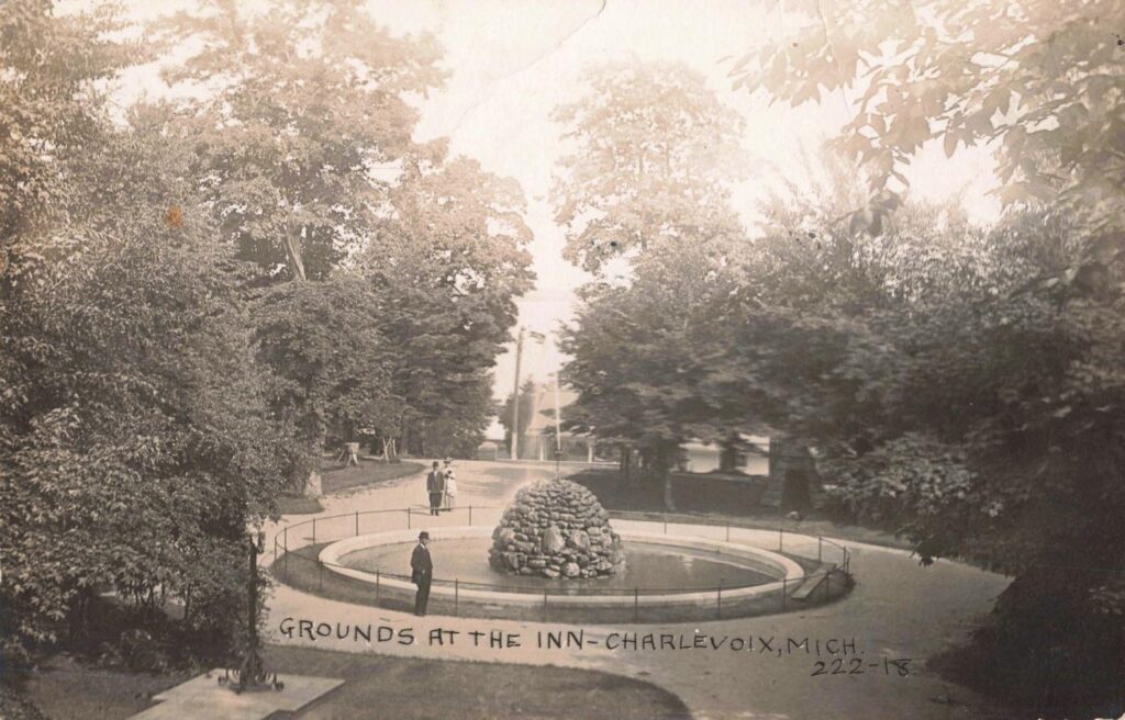 Historic inn grounds with fountain.