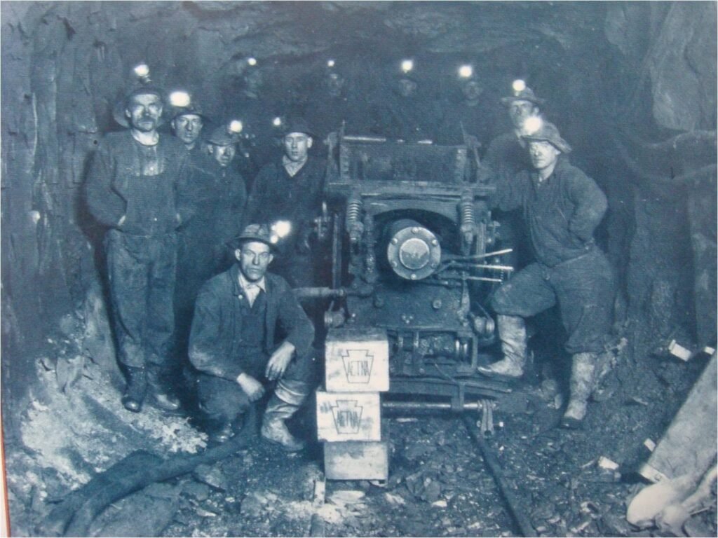 Group of miners in underground tunnel - Barnes-Hecker Mine Disaster 