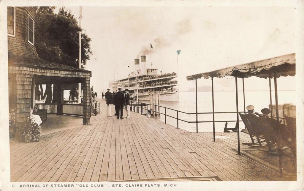 Historic steamer arrival at dock.