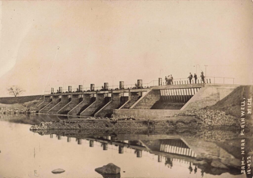 Historic dam with people on top
