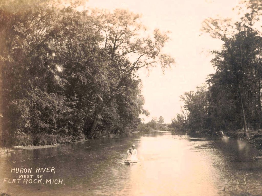 Serene river scene with trees - The history of flat rock