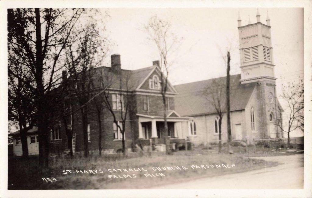 Historic Catholic church and parsonage in Palms Michigan in the early 1900s