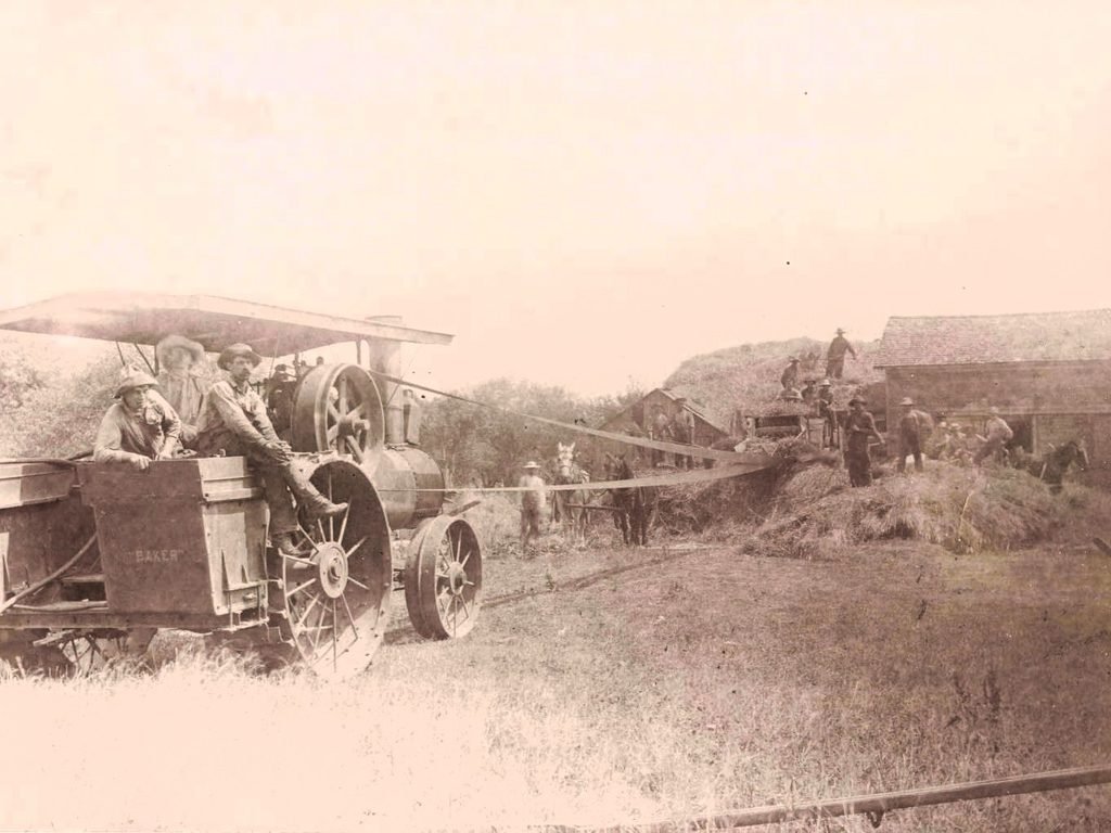 Steam Tractor powers a thresher