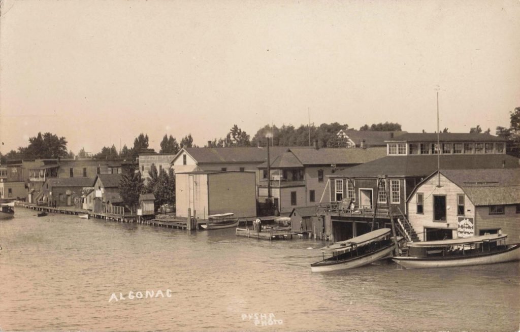 Vintage waterfront with boats and buildings. - History of Algonac Michigan