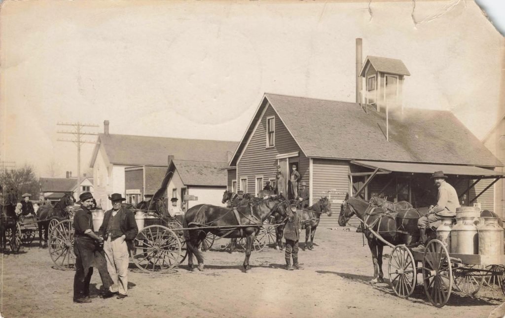 Historic creamery with horse-drawn carts