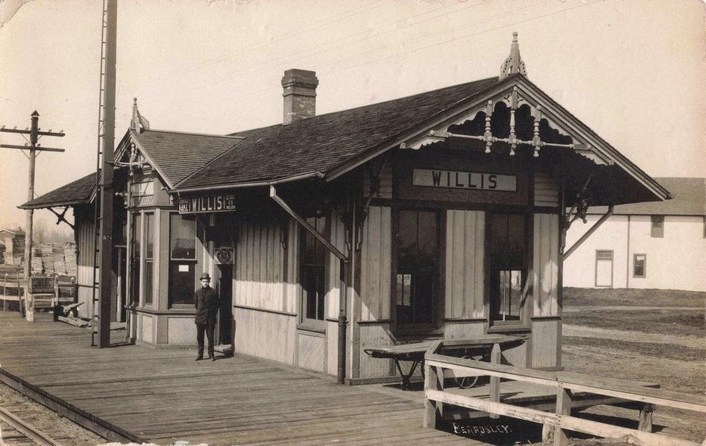 Historic train depot with man standing
