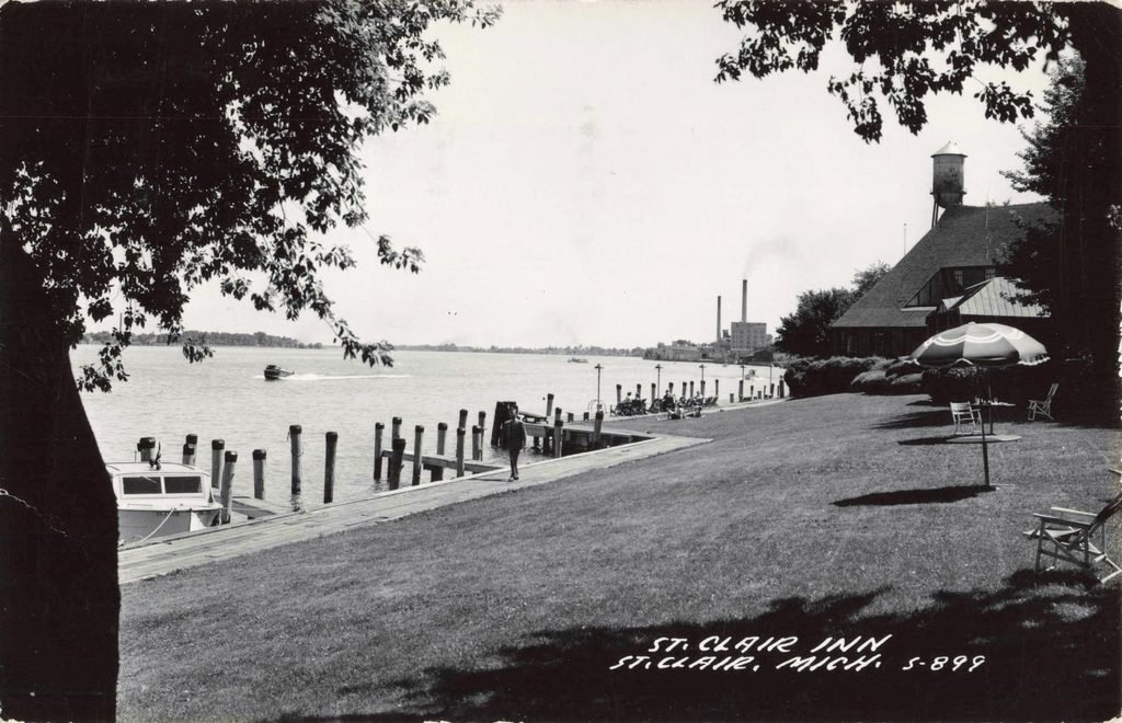 Black and white riverfront scene.